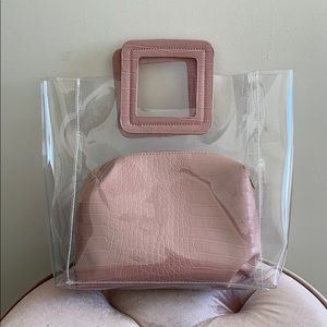 Clear handbag with pink snake print